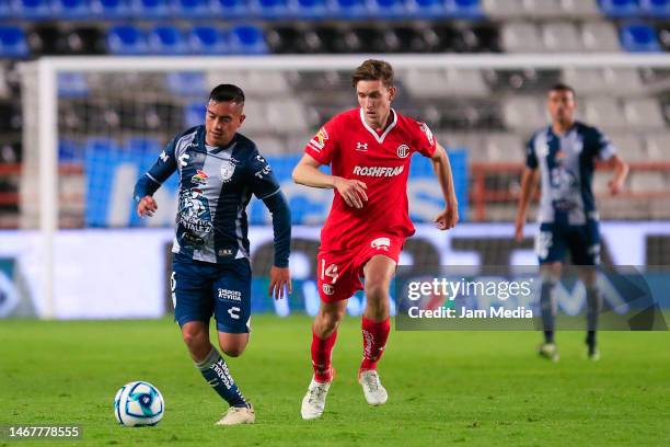 Erick Sanchez of Pachuca fights for the ball with Marcel Ruiz of Toluca during the 8th round match between Pachuca and Tijuana as part of the Torneo...