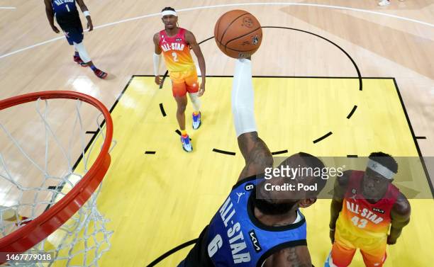 LeBron James of the Los Angeles Lakers dunks during the first quarter in the 2023 NBA All Star Game between Team Giannis and Team LeBron at Vivint...