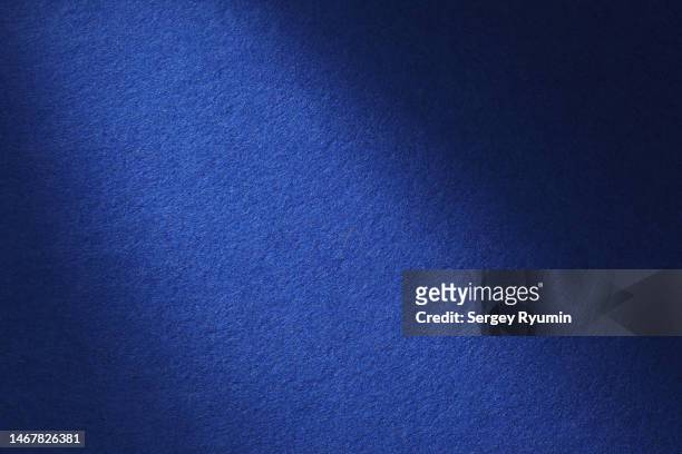 blue felt with lighting - blue felt stock pictures, royalty-free photos & images