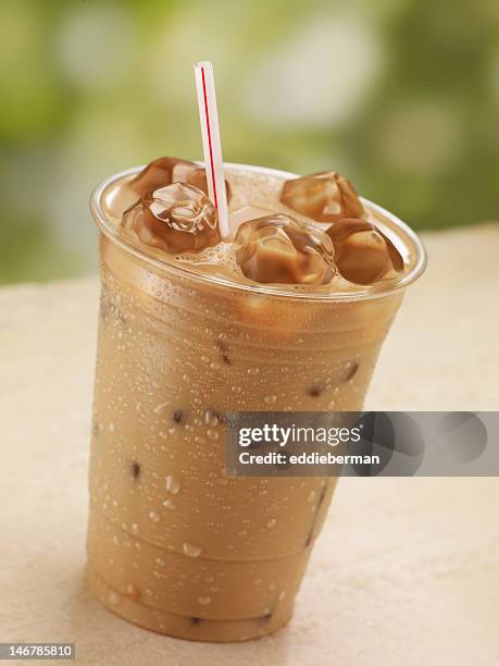 one glass of iced coffee - ice coffee stock pictures, royalty-free photos & images