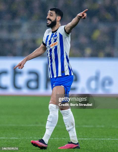 Tolga Cigerci of Hertha BSC gestures during the Bundesliga match between Borussia Dortmund and Hertha BSC at Signal Iduna Park on February 19, 2023...