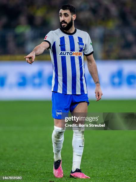 Tolga Cigerci of Hertha BSC gestures during the Bundesliga match between Borussia Dortmund and Hertha BSC at Signal Iduna Park on February 19, 2023...