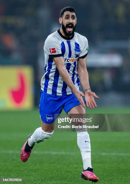 Tolga Cigerci of Hertha BSC gestures during the Bundesliga match between Borussia Dortmund and Hertha BSC at Signal Iduna Park on February 19, 2023...