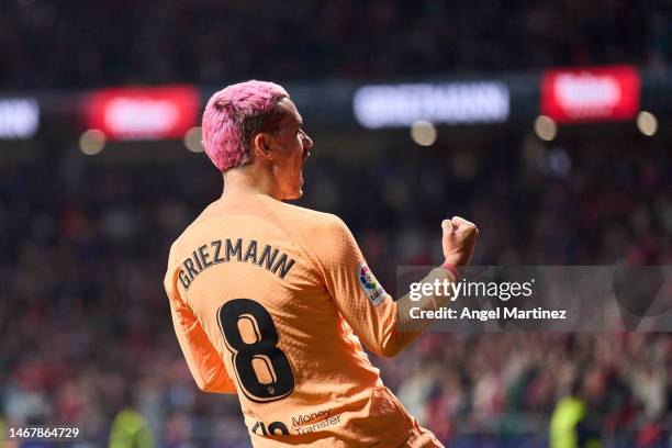 Antoine Griezmann of Atletico de Madrid celebrates after scoring the team's first goal during the LaLiga Santander match between Atletico de Madrid...