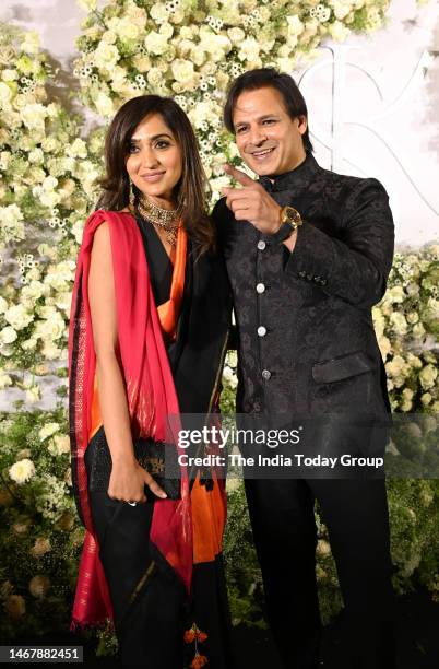 Mumbai, India Bollywood actor Vivek Oberoi and his wife Priyanka Alva poses during the wedding reception party of actors Sidharth Malhotra and Kiara...