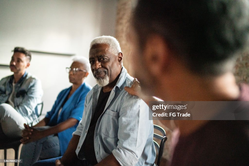 Senior man receiving a advice during a psychotherapy