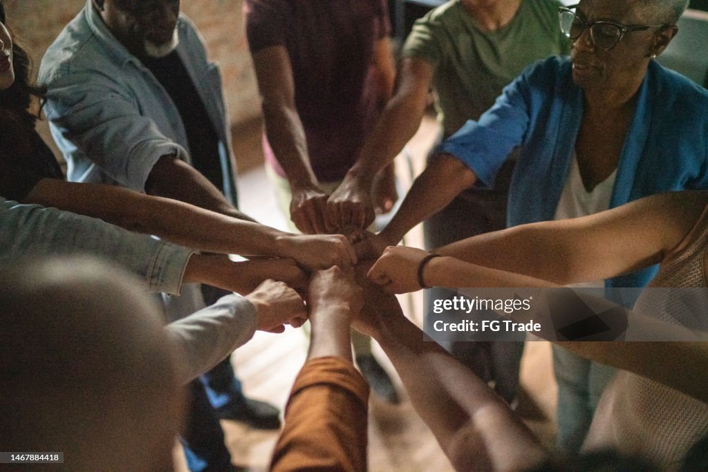 Team doing fist bump