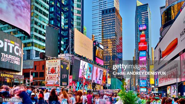 crowded times square. new york - times square stock-fotos und bilder