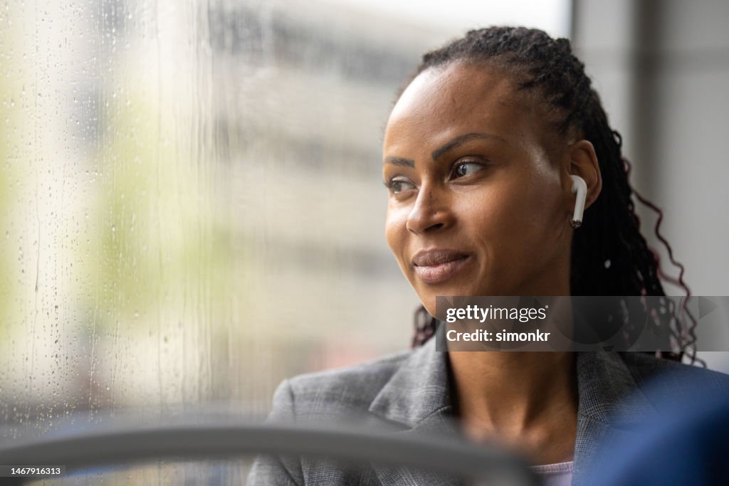 Woman sitting in bus