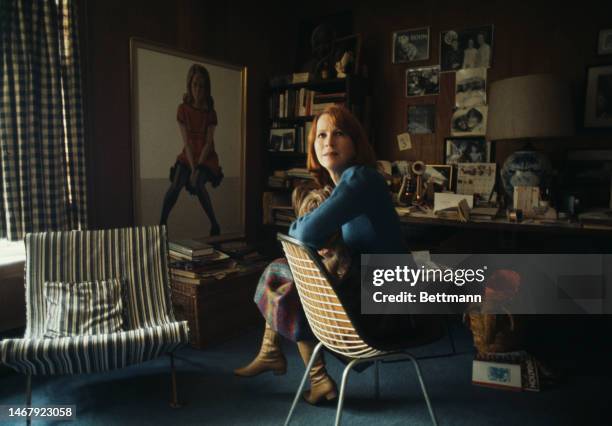 American actress Julie Harris at home in Irvington-on-Hudson in New York on February 11th, 1975. The painting in the background is by a friend, John...