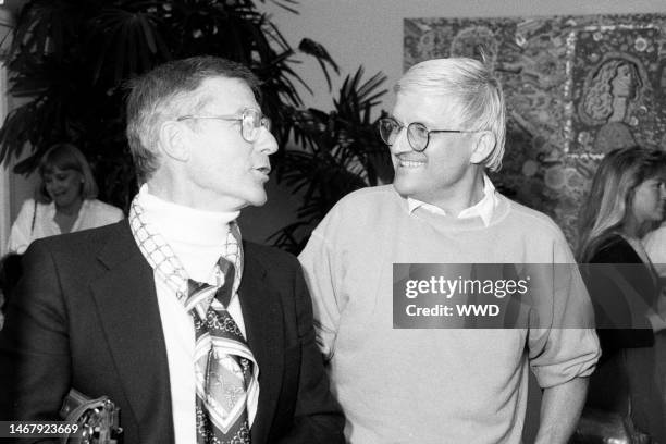 Roddy McDowall and David Hockney attend a party in Beverly Hills, California, on June 25, 1987.