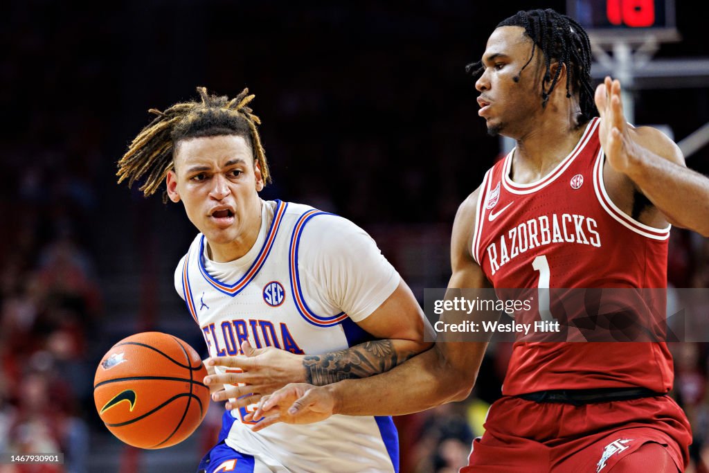 Ricky Riley Florida Riley Kugel of the Florida Gators drives to the basket against Ricky ...