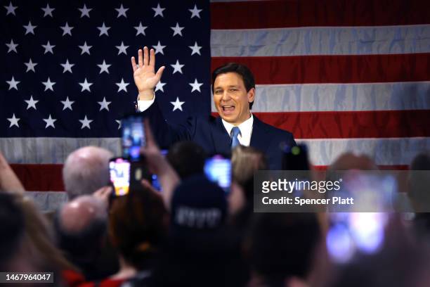 Florida Gov. Ron DeSantis waves as he speaks to police officers about protecting law and order at Prive catering hall on February 20, 2023 in the...