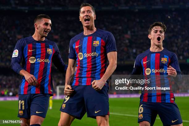 Robert Lewandowski of FC Barcelona celebrates with teammates his team's second goal during the LaLiga Santander match between FC Barcelona and Cadiz...