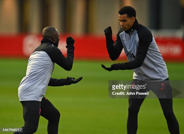 Naby Keita and Cody Gakpo of Liverpool during a training session ahead of their UEFA Champions League round of 16 match against Real Madrid at...