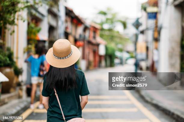 city bound: a tourist's exploration from behind the scenes - george town penang stockfoto's en -beelden