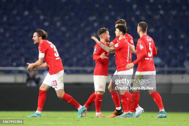 Player of Hallescher FC celebrate after winning the 3. Liga match between VfB Oldenburg and Hallescher FC at Heinz von Heiden Arena on February 20,...