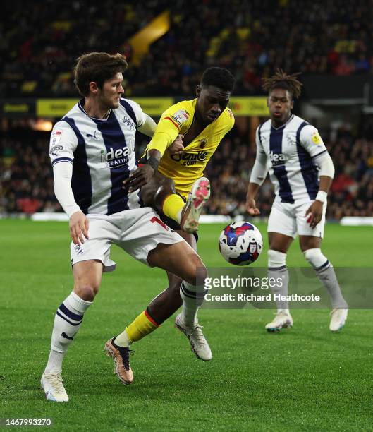 John Swift of West Bromwich Albion and Ismaila Sarr of Watford battle for the ball during the Sky Bet Championship match between Watford and West...