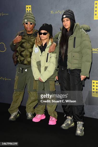 Pharrell Williams, Rocket Ayer Williams and Helen Lasichanh attend the Moncler Genius presentation during London Fashion Week February 2023 on...