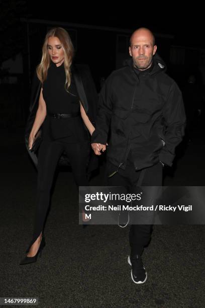 Rosie Huntington Whiteley and Jason Statham at Burberry at Kennington Park during London Fashion Week February 2023 on February 20, 2023 in London,...