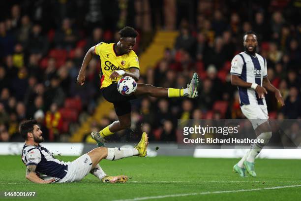 Okay Yokuslu of West Bromwich Albion tackles Ismael Kone of Watford during the Sky Bet Championship match between Watford and West Bromwich Albion at...