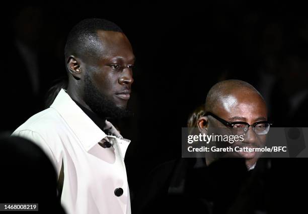 Stormzy and Edward Enninful attend the Burberry show during London Fashion Week February 2023 on February 20, 2023 in London, England.