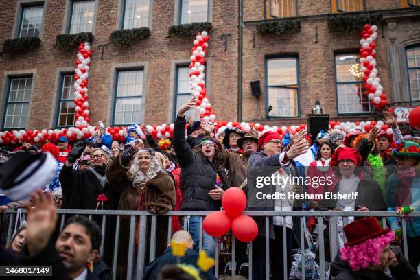 Carnival-goers attend the annual Rose Monday carnival parade on February 20, 2023 in Dusseldorf, Germany. Carnival season is underway across the...