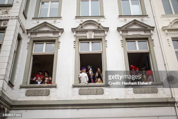 Spectators watch the annual Rose Monday carnival parade on February 20, 2023 in Dusseldorf, Germany. Carnival season is underway across the Rhineland...