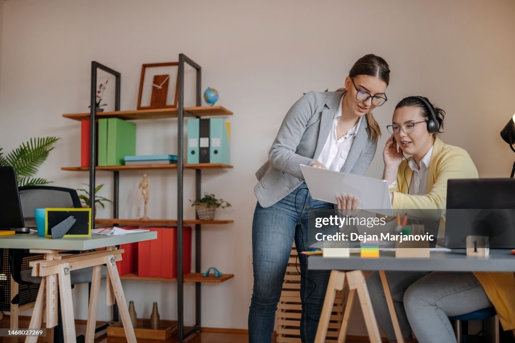 Office Worker Using Technology Women Working In Office Using Technology High-Res Stock Photo - Getty ...