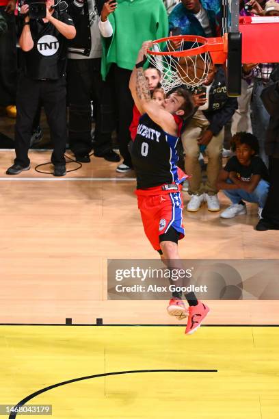 Mac McClung of the Philadelphia 76ers dunks the ball during the final round of the 2023 NBA All Star AT&T Slam Dunk Contest at Vivint Arena on...