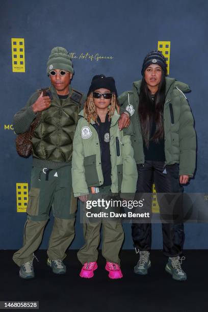 Pharrell Williams, Rocket Williams and Helen Lasichanh attend the Moncler Presents: The Art of Genius at Olympia London on February 20, 2023 in...