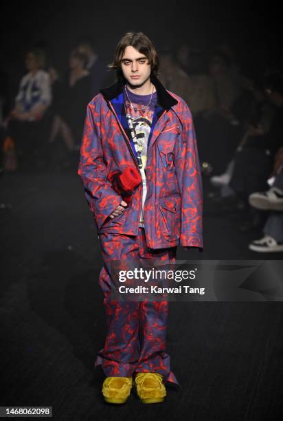 Lennon Gallagher walks the runway at the Burberry show during London Fashion Week February 2023 in Kennington Park on February 20, 2023 in London,...