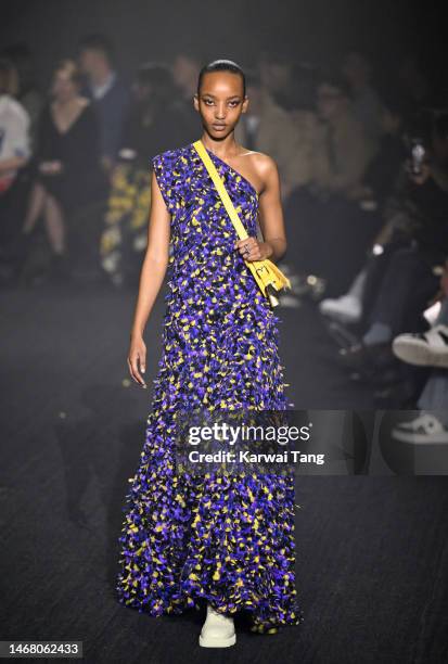 Model walks the runway at the Burberry show during London Fashion Week February 2023 in Kennington Park on February 20, 2023 in London, England.