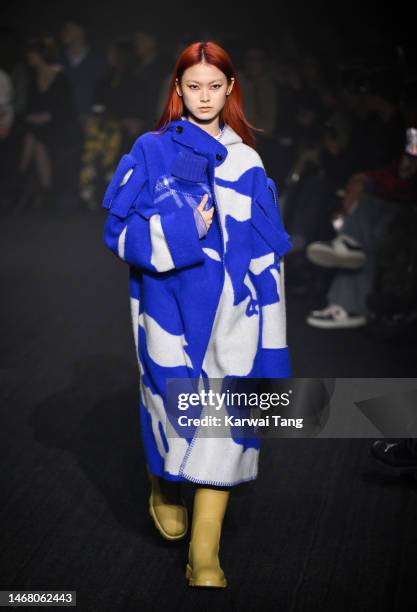 Model walks the runway at the Burberry show during London Fashion Week February 2023 in Kennington Park on February 20, 2023 in London, England.