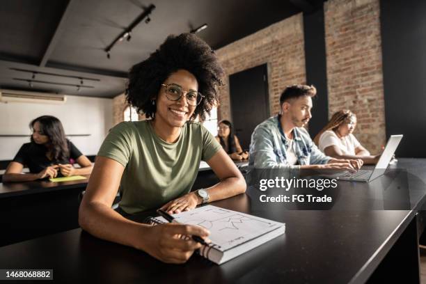 portrait of a young woman in the classroom - study participant stock pictures, royalty-free photos & images