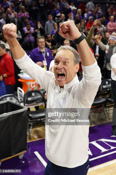 Head coach Chris Collins of the Northwestern Wildcats celebrates after defeating the Indiana Hoosiers 64-62 at Welsh-Ryan Arena on February 15, 2023...