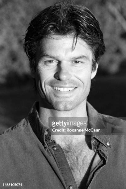 Actor Harry Hamlin enjoys his backyard in March 1995 in Beverly Hills, California. Photo by Roxanne McCann/Getty Images)