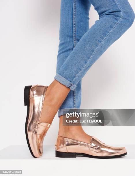 golden college shoe - skinny jeans on white stock pictures, royalty-free photos & images