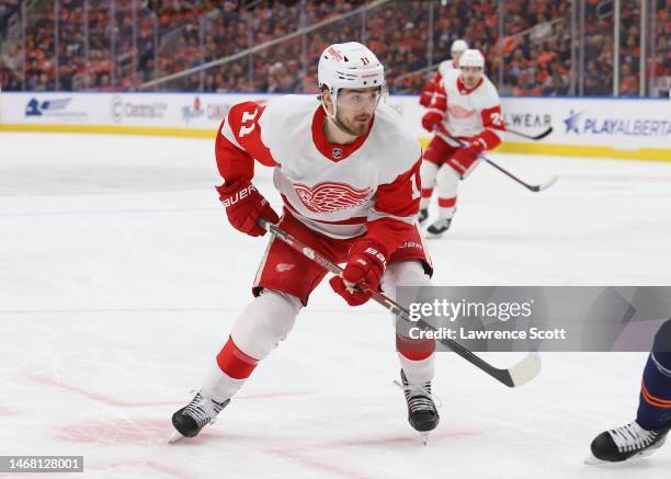 Filip Zadina of the Detroit Red Wings pursues the puck in the first period against the Edmonton Oilers on February 15, 2023 at Rogers Place in...