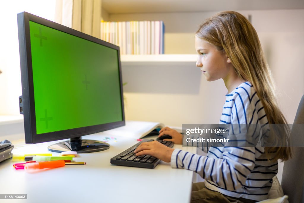 Girl Using Computer Monitor High-Res Stock Photo - Getty Images