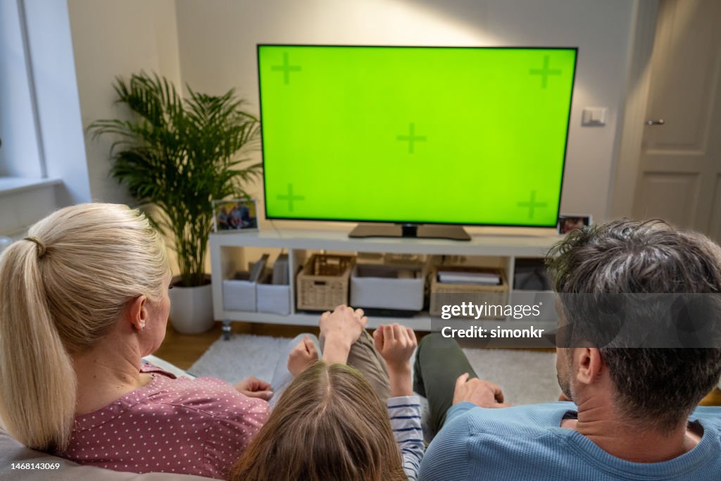 Family watching TV