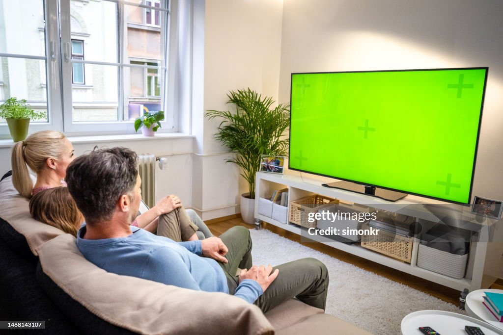 Family watching TV