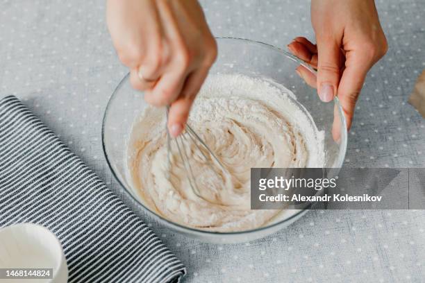process of making dough for pancakes or waffle crepes on table. gluten free flour and sugar free bakery. healthy eating - gluten free bread stockfoto's en -beelden