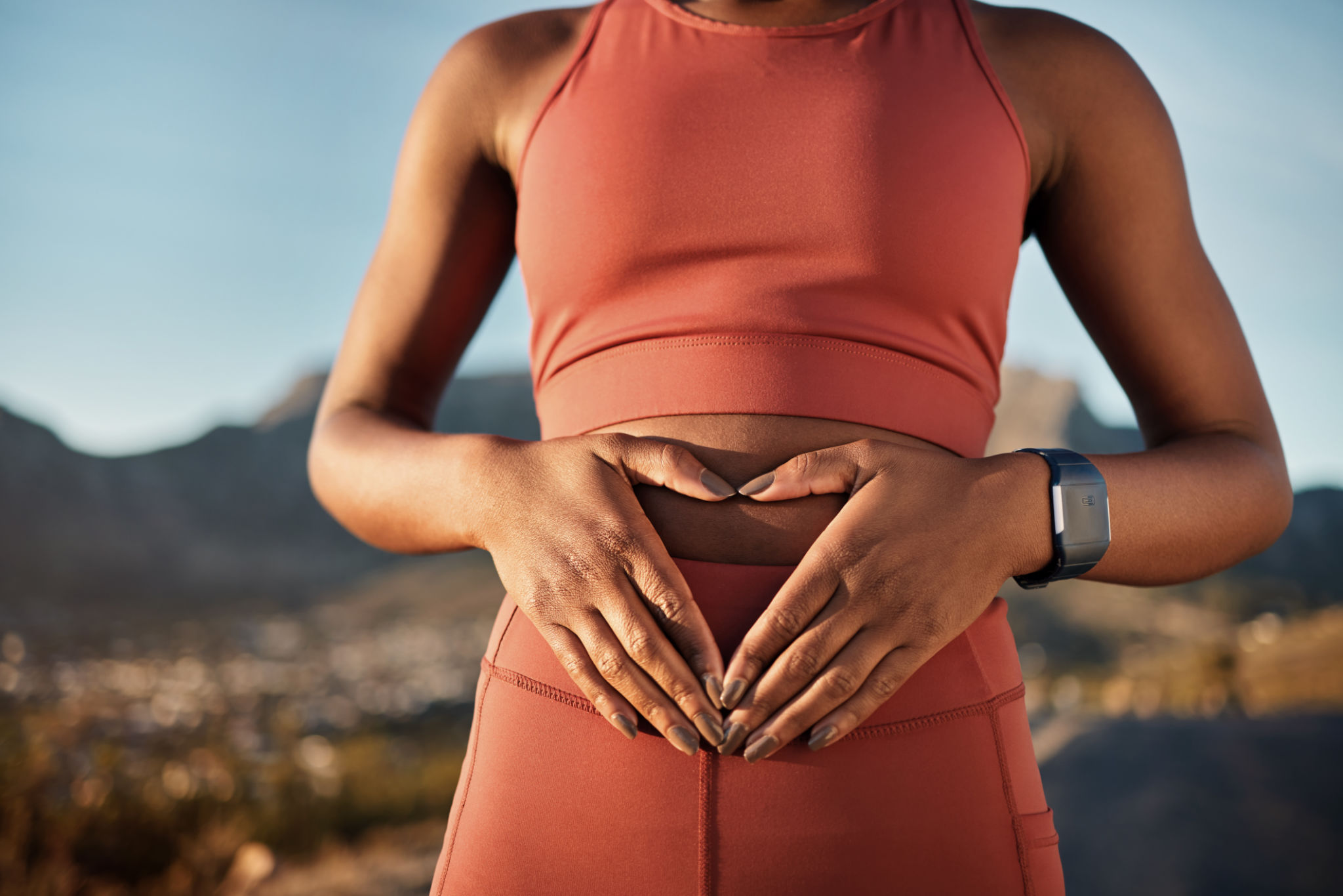 Woman, nature fitness or hands on stomach in diet wellness, body healthcare or abs muscle growth in workout training or sunrise exercise. Zoom, sports athlete or person, belly digestion or strong gut Woman, nature fitness or hands on stomach in diet wellness, body healthcare or abs muscle growth in workout training or sunrise exercise. Zoom, sports athlete or person, belly digestion or strong gut