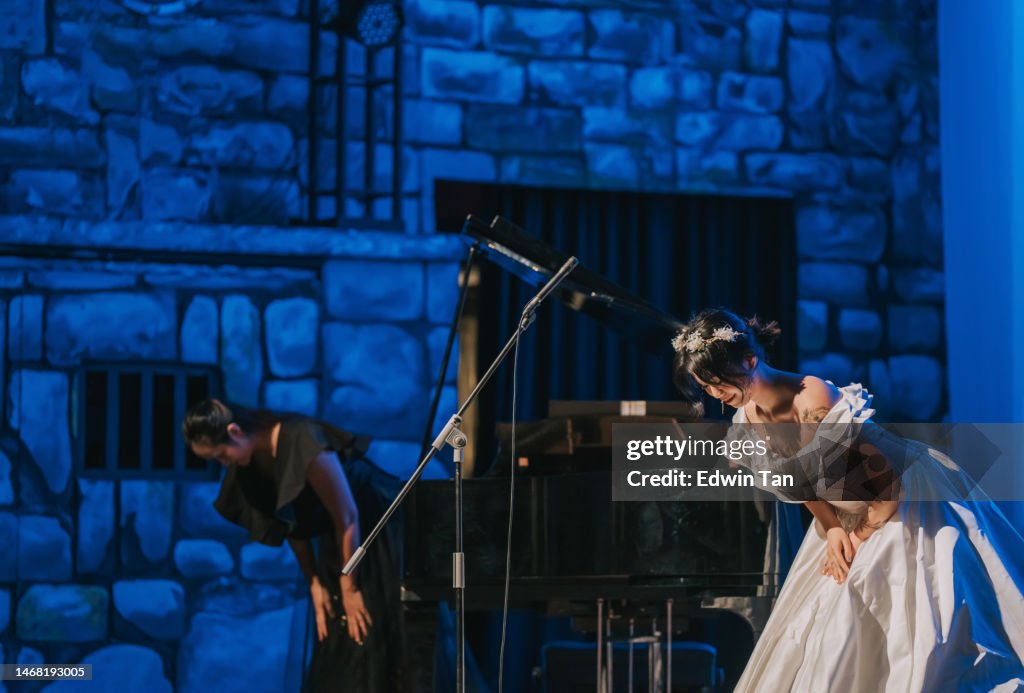 Performning Opera Young Chinese Female Opera Singer Performing Solo On Stage With Pianist ...
