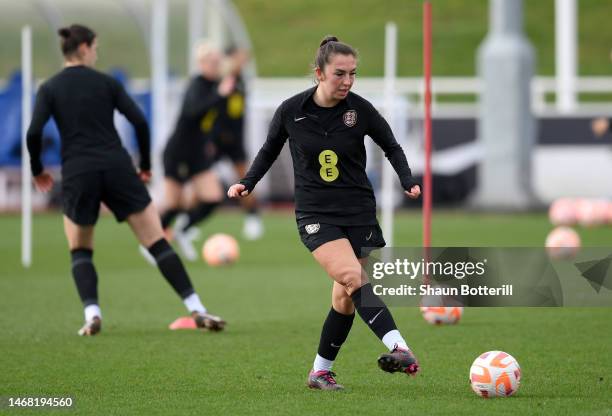 Katie Zelem of England passes the ball during a training session at St George's Park on February 21, 2023 in Burton upon Trent, England.