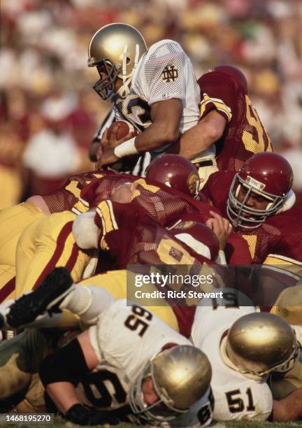 Hiawatha Francisco, Running Back for the Notre Dame Fighting Irish in motion running the football is tackled attempting to jump the USC Trojans...