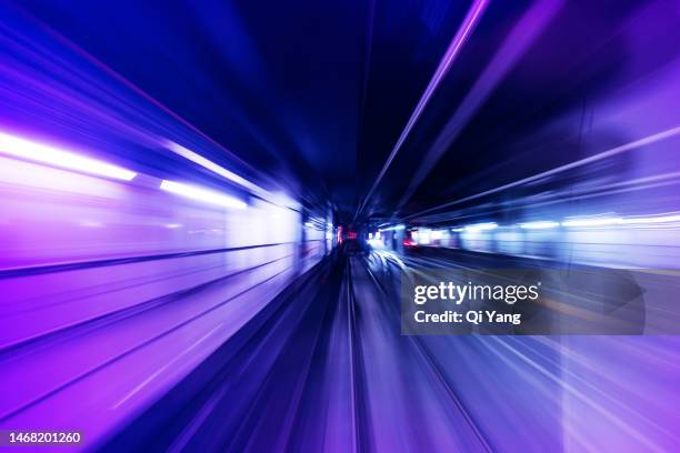 long exposure of subway tunnel - bahntunnel stock-fotos und bilder