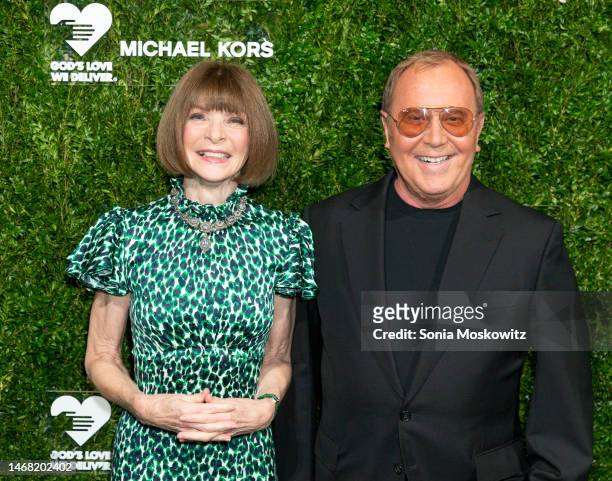 British-American fashion editor & journalist Anna Wintour and American fashion designer Michael Kors pose at a God's Love We Deliver event at...