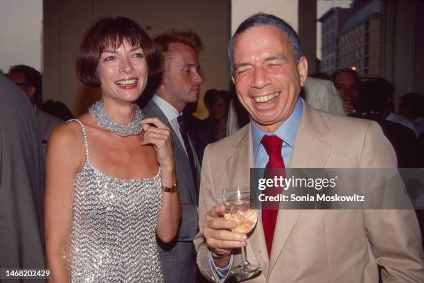 British-American fashion editor & journalist Anna Wintour and American media mogul SI Newhouse share a laugh as they attend a party , New York, New...